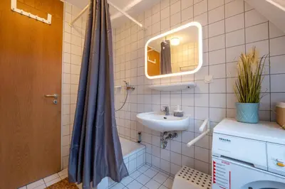 Ein Badezimmer in der Unterkunft Apartment im Historischen Altbau am Marktplatz - Disney+, 300mb/s Internet