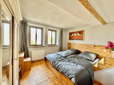 Ein Bett oder Betten in einem Zimmer der Unterkunft Atelierhaus Meißen
