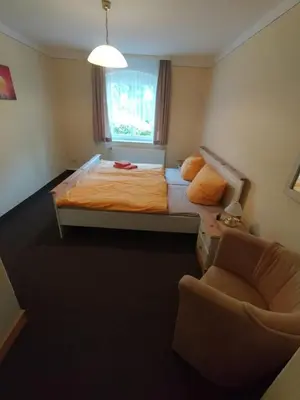 Ein Bett oder Betten in einem Zimmer der Unterkunft Ferienwohnung 3 Am Zahnsborn