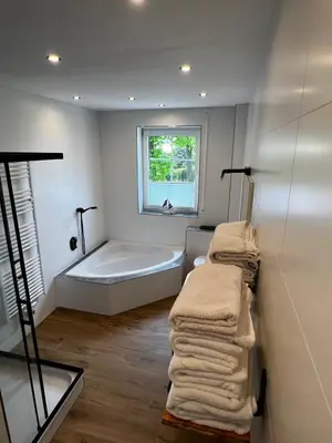 Ein Bett oder Betten in einem Zimmer der Unterkunft Ferienwohnung zum Scheibe-See