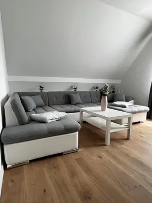 Ein Sitzbereich in der Unterkunft Ferienwohnung zum Scheibe-See