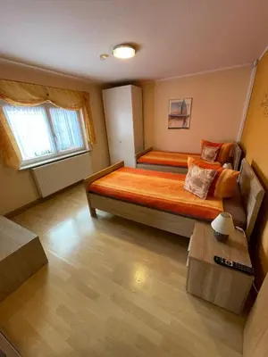 Ein Bett oder Betten in einem Zimmer der Unterkunft Ferienwohnung ILSENHOF