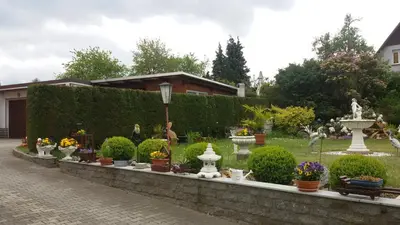 Ein Garten an der Unterkunft Ferienwohnung ILSENHOF