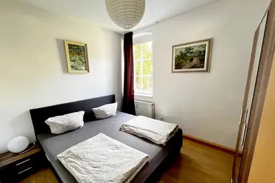 Ein Bett oder Betten in einem Zimmer der Unterkunft Ferienwohnung