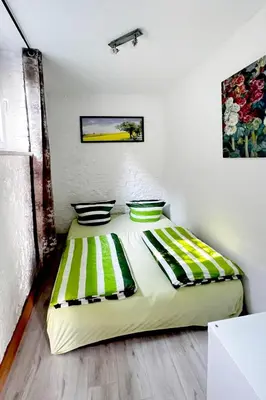 Ein Bett oder Betten in einem Zimmer der Unterkunft Ferienwohnung