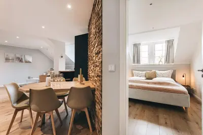 Ein Bett oder Betten in einem Zimmer der Unterkunft TIP! Toplage in Dresden! Moderne 100 qm Ferienwohnung für Familien und kleine Gruppen