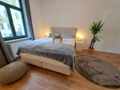 Ein Bett oder Betten in einem Zimmer der Unterkunft Gemütliche helle Ferienwohnung