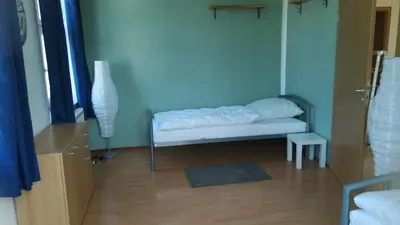 Ein Bett oder Betten in einem Zimmer der Unterkunft Ferienwohnung Sonnenblick