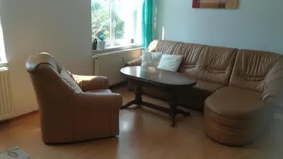 Ein Sitzbereich in der Unterkunft Ferienwohnung Sonnenblick