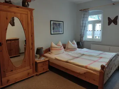 Ein Bett oder Betten in einem Zimmer der Unterkunft Pension Grenzeck
