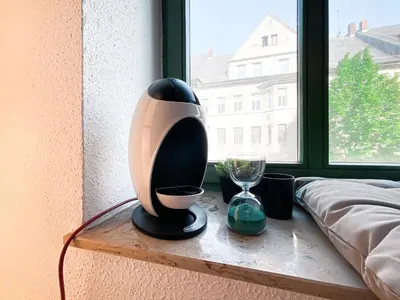 Ein Bett oder Betten in einem Zimmer der Unterkunft Zentrales Apartment mit TV, Küche und Mikrowelle