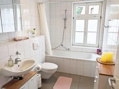 Ein Badezimmer in der Unterkunft F3 Urlaubsmagie - Pool, Garten & Terrasse - 4P
