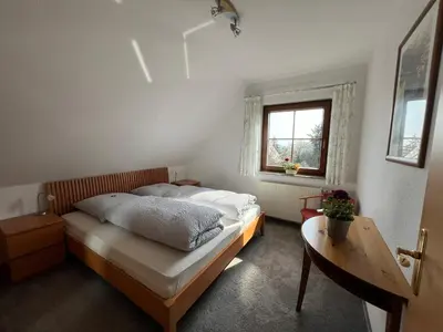 Ein Bett oder Betten in einem Zimmer der Unterkunft Ferienwohnung Dresden