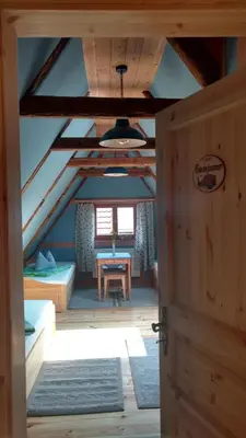 Ein Bett oder Betten in einem Zimmer der Unterkunft NaturflairHaus
