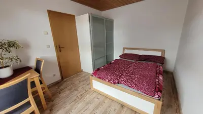 Ein Bett oder Betten in einem Zimmer der Unterkunft Bei Mallok's