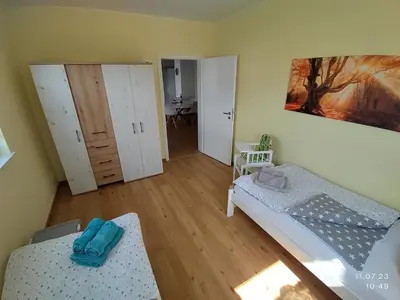 Ein Bett oder Betten in einem Zimmer der Unterkunft Ferienapartment 21