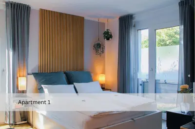 Ein Bett oder Betten in einem Zimmer der Unterkunft Modernes Apartment/Zentrum/WI-FI/Parkplatz