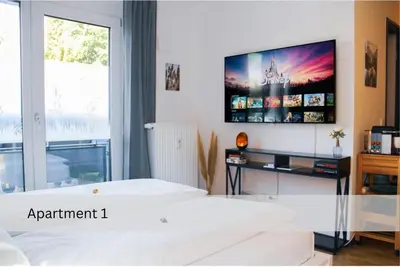 Ein Bett oder Betten in einem Zimmer der Unterkunft Modernes Apartment/Zentrum/WI-FI/Parkplatz