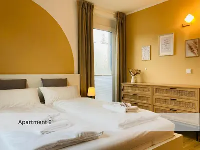 Ein Bett oder Betten in einem Zimmer der Unterkunft Modernes Apartment/Zentrum/WI-FI/Parkplatz