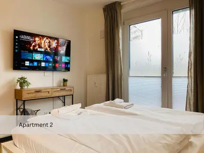 Ein Bett oder Betten in einem Zimmer der Unterkunft Modernes Apartment/Zentrum/WI-FI/Parkplatz