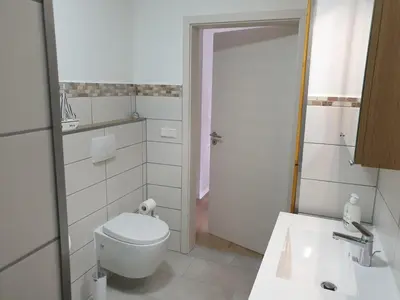Ein Badezimmer in der Unterkunft NEU! Ferienhaus Kurio