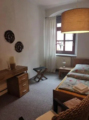 Ein Bett oder Betten in einem Zimmer der Unterkunft Ferienwohnung Carola Scholze