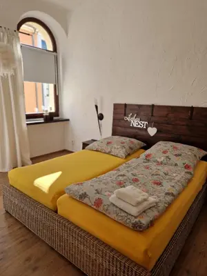 Ein Bett oder Betten in einem Zimmer der Unterkunft Ferienwohnung Carola Scholze