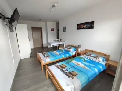 Ein Bett oder Betten in einem Zimmer der Unterkunft Gästewohnung Fischer