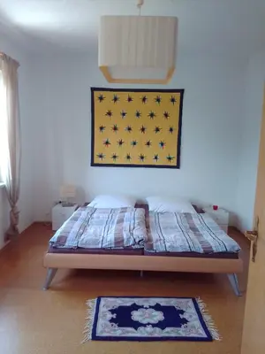 Ein Bett oder Betten in einem Zimmer der Unterkunft Ferienwohnung Zuschke