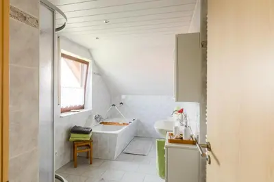 Ein Bett oder Betten in einem Zimmer der Unterkunft Ferienwohnung Hetzdorf - Urlaub am Tharandter Wald