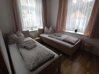 Ein Bett oder Betten in einem Zimmer der Unterkunft Ferienwohnung Lange