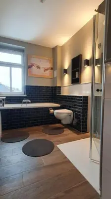 Ein Badezimmer in der Unterkunft Monteurswohnung Roßwein - Zentral - Küche