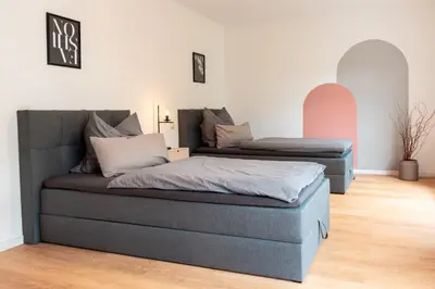 Ein Sitzbereich in der Unterkunft Studio THREE / Wifi / Netflix / 3 getrennte Betten