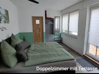 Ein Sitzbereich in der Unterkunft Pension Mojito Senftenberg