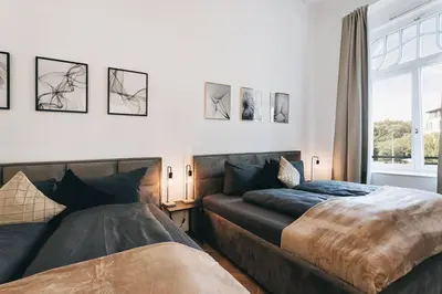 Ein Bett oder Betten in einem Zimmer der Unterkunft TIP! Design-Apartment in Toplage 75qm in Szeneviertel