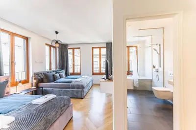 Ein Bett oder Betten in einem Zimmer der Unterkunft TIP! Design trifft Lage 120 qm Premium Apartment