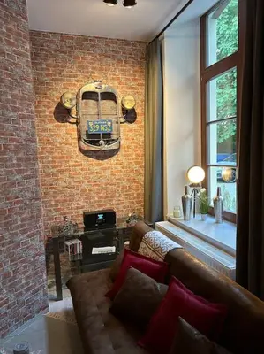 Ein Sitzbereich in der Unterkunft Ruhige Wohnung im Fabrikstil in Chemnitz