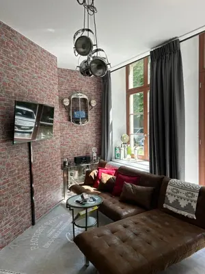 Ein Sitzbereich in der Unterkunft Ruhige Wohnung im Fabrikstil in Chemnitz