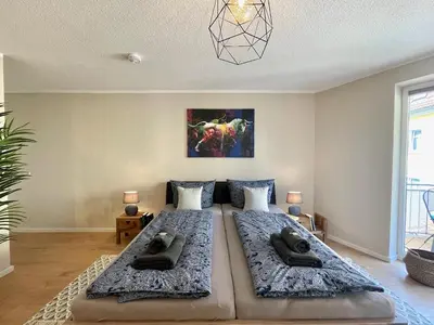 Ein Bett oder Betten in einem Zimmer der Unterkunft Apartment Uptown im Herzen der Dresdner Neustadt - stilvoll, zentral, top Anbindung