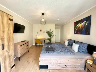 Ein Bett oder Betten in einem Zimmer der Unterkunft Apartment Uptown im Herzen der Dresdner Neustadt - stilvoll, zentral, top Anbindung