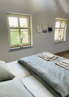 Ein Bett oder Betten in einem Zimmer der Unterkunft Traumvilla im Herzen Hainichens
