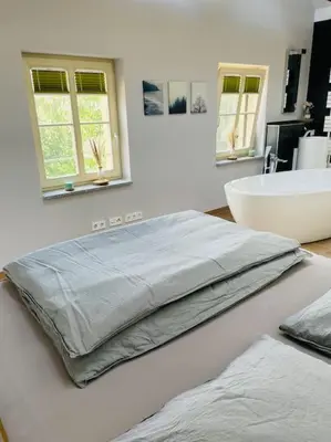 Ein Bett oder Betten in einem Zimmer der Unterkunft Traumvilla im Herzen Hainichens