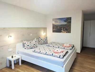 Ein Bett oder Betten in einem Zimmer der Unterkunft S3 - Urlaubsmagie - für 4P mitten im Elbsandsteingebirge