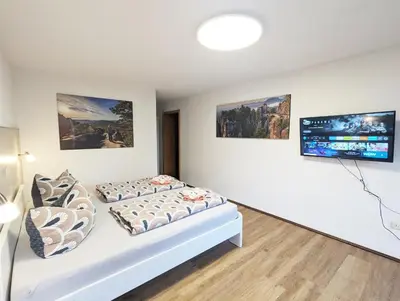 Ein Bett oder Betten in einem Zimmer der Unterkunft S3 - Urlaubsmagie - für 4P mitten im Elbsandsteingebirge