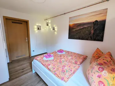 Ein Bett oder Betten in einem Zimmer der Unterkunft S3 - Urlaubsmagie - für 4P mitten im Elbsandsteingebirge
