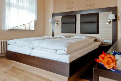 Ein Bett oder Betten in einem Zimmer der Unterkunft Bergrestaurant Schwedenstein