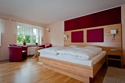 Ein Bett oder Betten in einem Zimmer der Unterkunft Bergrestaurant Schwedenstein