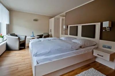 Ein Bett oder Betten in einem Zimmer der Unterkunft Bergrestaurant Schwedenstein