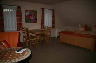 Ein Bett oder Betten in einem Zimmer der Unterkunft Ferienhof An der Weide