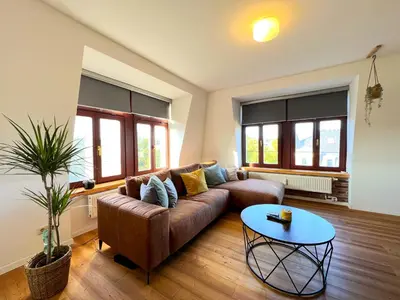 Ein Sitzbereich in der Unterkunft Cozy Apartment near city center Dresden by R&L